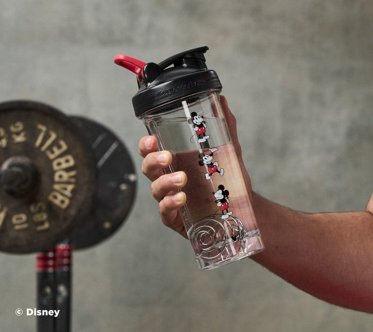 pro-series-s8 Mickey_Mouse_Protein_Shaker_Bottle_Being_Held_In_the_Gym.jpg